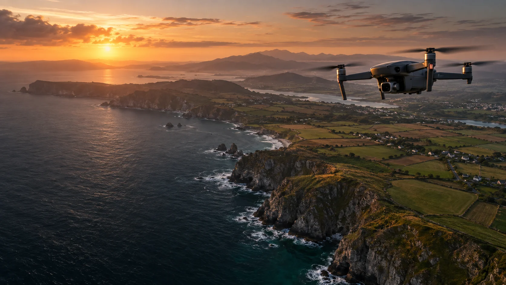Drone flying above a European coastal landscape at sunrise